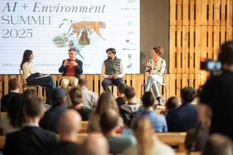 Panel discussion at the AI + Environment Summit 2025 at Switzerland Innovation Park Zurich. Researchers and industry experts discuss how artificial intelligence can drive sustainable innovation for climate, biodiversity, and environmental protection.
